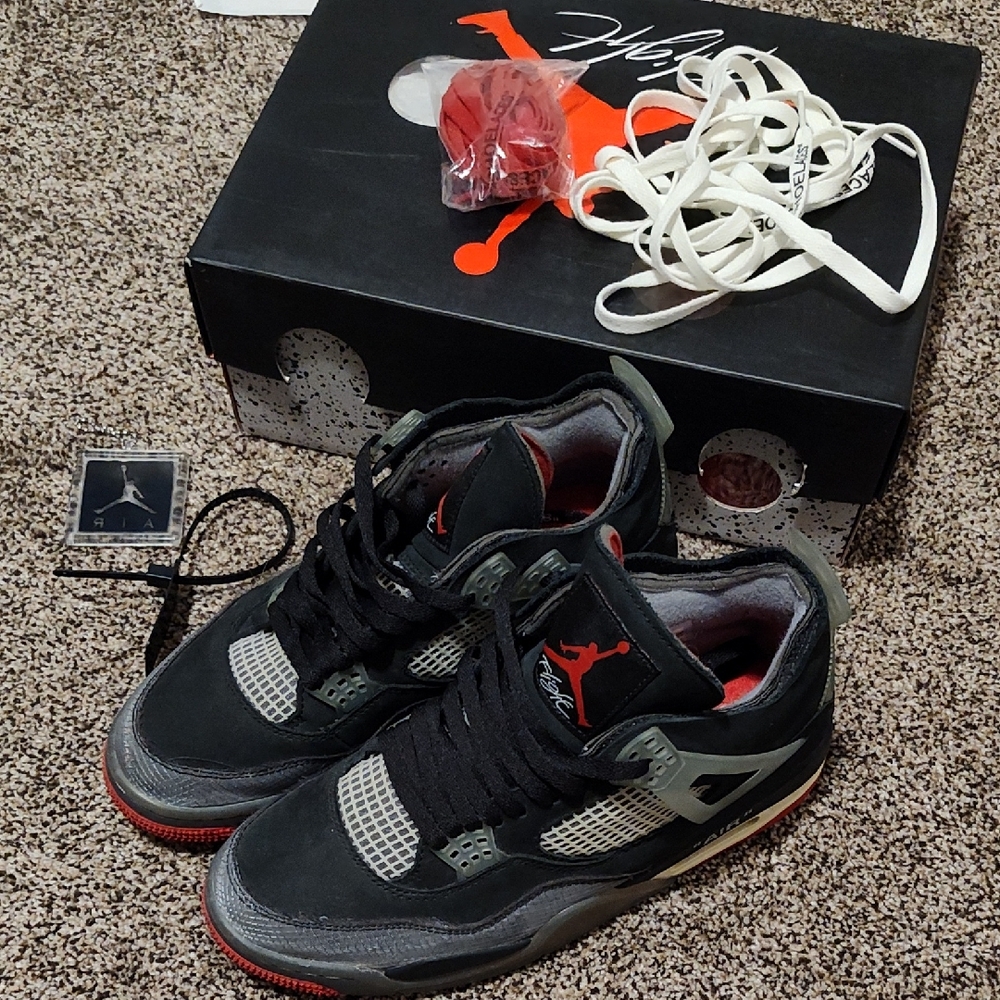 Jordan Black and Red Retro 4 Sneakers